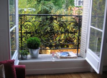 Enjoy a glass of wine on the balcony