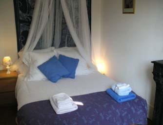 The bedroom is light and spacious