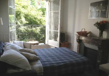 Living room with sofa bed prepared for sleeping